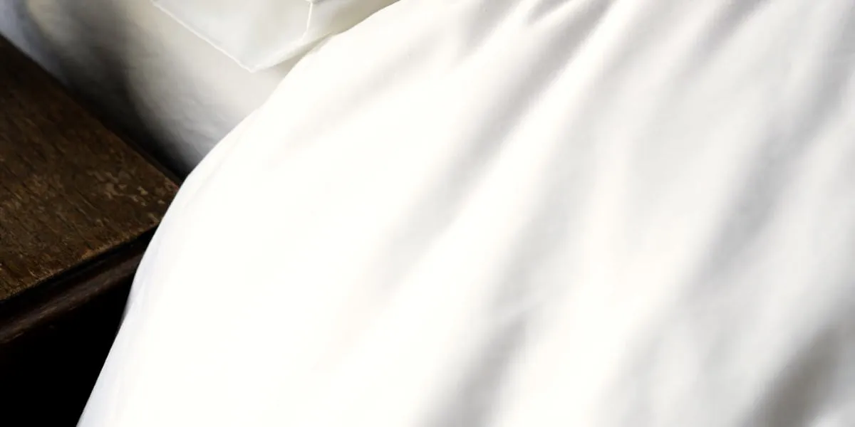 Crisp white bedding, freshly made