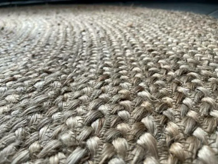 A braided natural-fibre rug